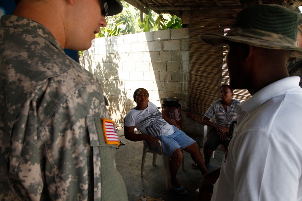 399th Psychological Operations conducts a post assessment of a medical readiness training exercise