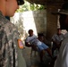 399th Psychological Operations conducts a post assessment of a medical readiness training exercise