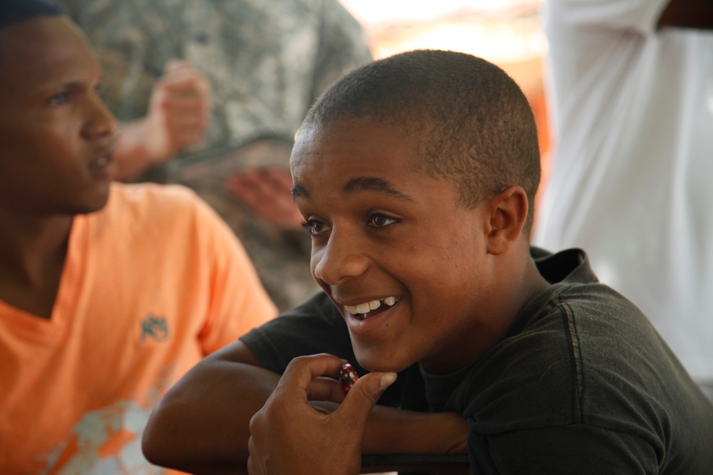 399th Psychological Operations conducts a post assessment of a medical readiness training exercise