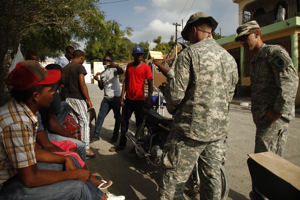 399th Psychological Operations conducts a post assessment of a medical readiness training exercise