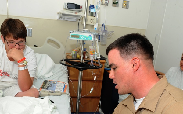 Marines, Sailors bring smiles to hospital children during Fleet Week Port Everglades