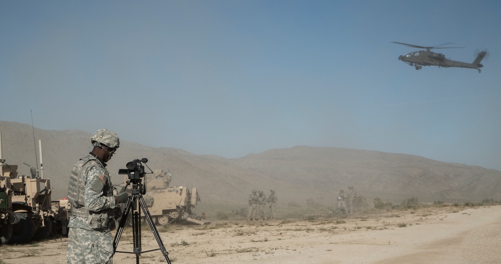 Combat videographer records AH-6E Apache Guardian