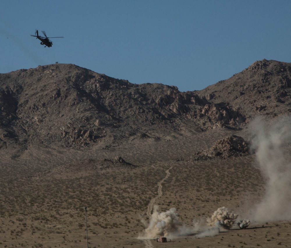 AH-6E Apache Guardian engages enemies