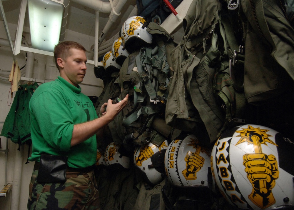 Flashlight inspection aboard USS George Washington