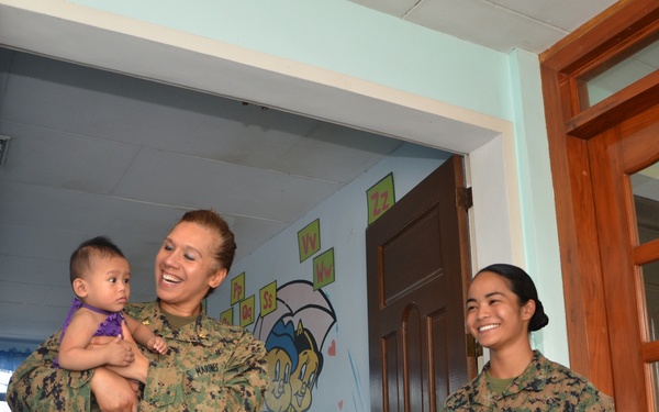 Philippine, US service members, children play together at Children’s Home