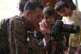 Philippine, US service members, children play together at Children’s Home