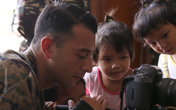 Philippine, US service members, children play together at Children’s Home