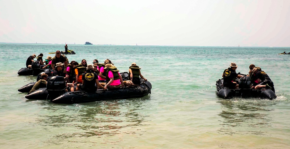 Spouses fire, float, fight during Recon Rhonda event