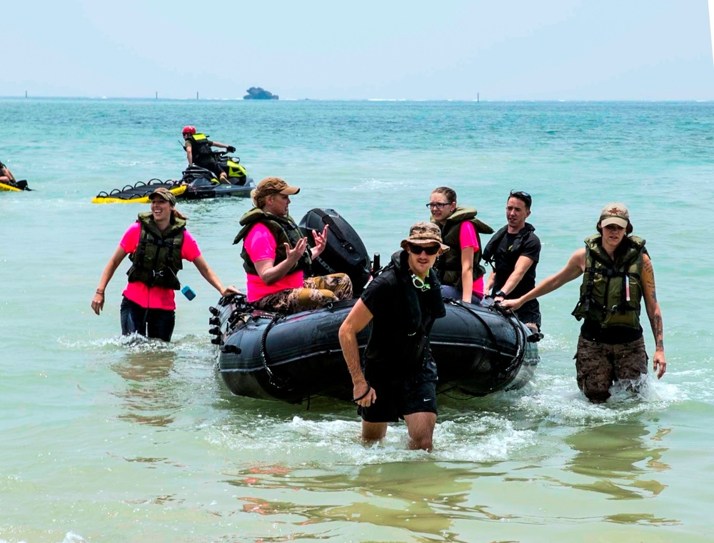 Spouses fire, float, fight during Recon Rhonda event