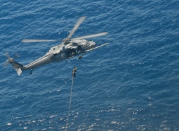 79th Rescue Squadron HC-130J Combat King II flies injured sailors to California