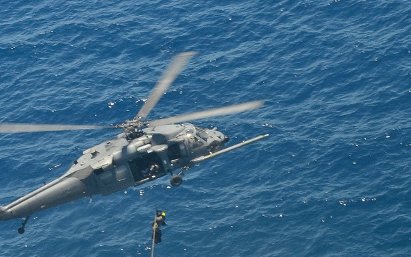 79th Rescue Squadron HC-130J Combat King II flies injured sailors to California