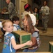 Girl Scouts donate cookies to troops overseas