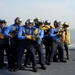 USS George Washington sailors at work