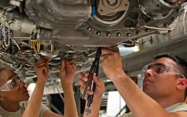 Remove and install the main fuel pump on an F-100 engine from an F-15 aircraft