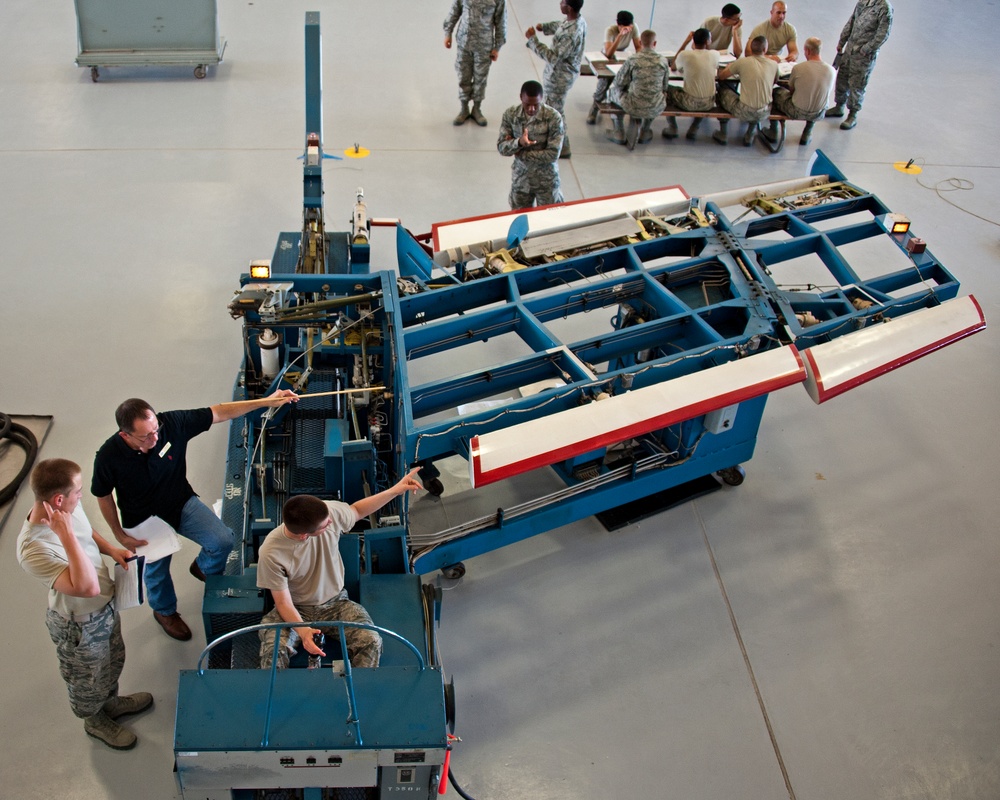 Adjust the role trim on an A-7 Flight Control Trainer