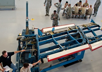 Adjust the role trim on an A-7 Flight Control Trainer