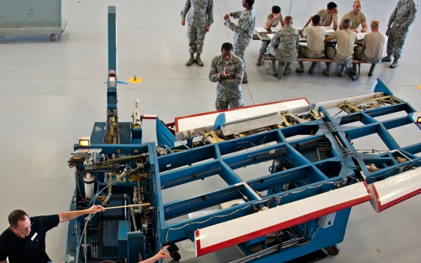 Adjust the role trim on an A-7 Flight Control Trainer