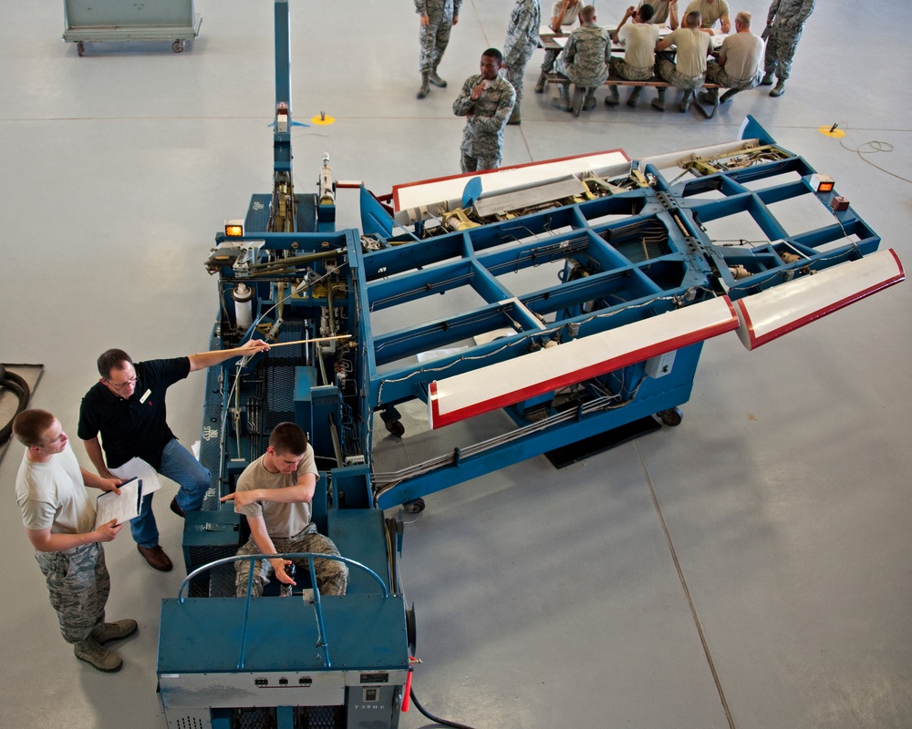 Adjust the role trim on an A-7 Flight Control Trainer