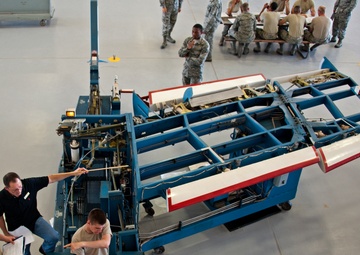 Adjust the role trim on an A-7 Flight Control Trainer