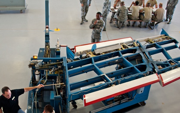 Adjust the role trim on an A-7 Flight Control Trainer