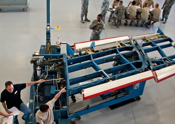 Adjust the role trim on an A-7 Flight Control Trainer