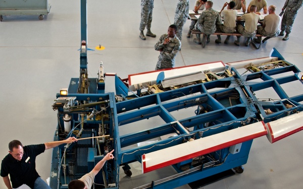 Adjust the role trim on an A-7 Flight Control Trainer