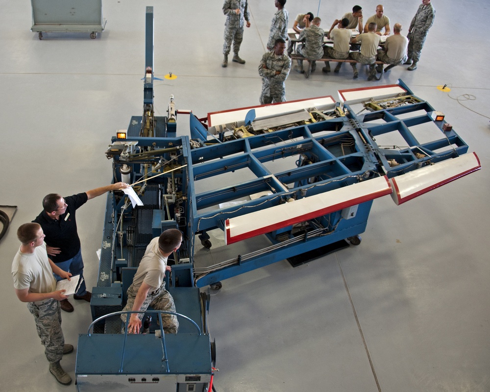 Adjust the role trim on an A-7 Flight Control Trainer