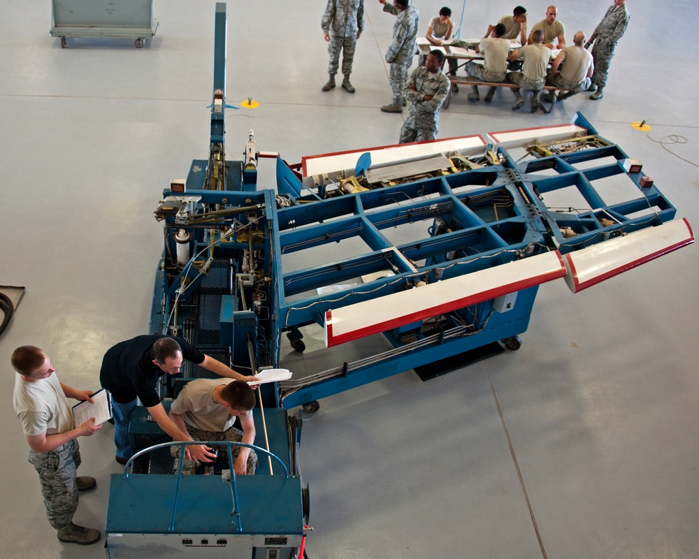 Adjust the role trim on an A-7 Flight Control Trainer