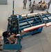 Adjust the role trim on an A-7 Flight Control Trainer