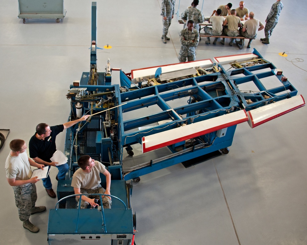 Adjust the role trim on an A-7 Flight Control Trainer