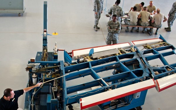 Adjust the role trim on an A-7 Flight Control Trainer