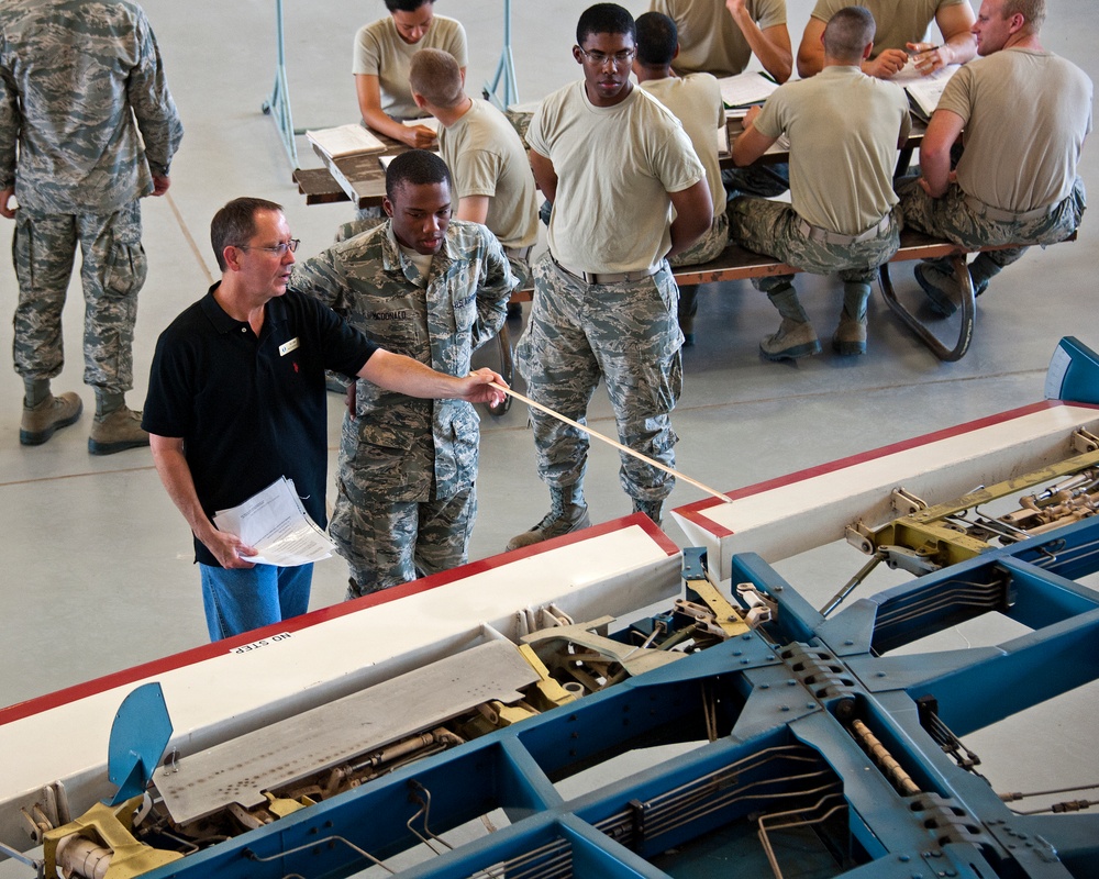 Adjust the role trim on an A-7 Flight Control Trainer