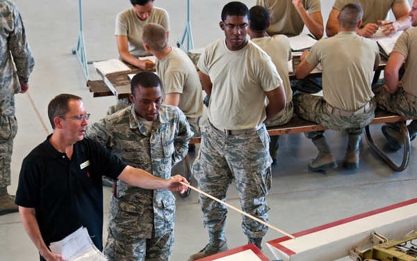 Adjust the role trim on an A-7 Flight Control Trainer