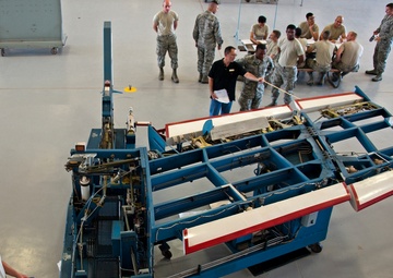 Adjust the role trim on an A-7 Flight Control Trainer