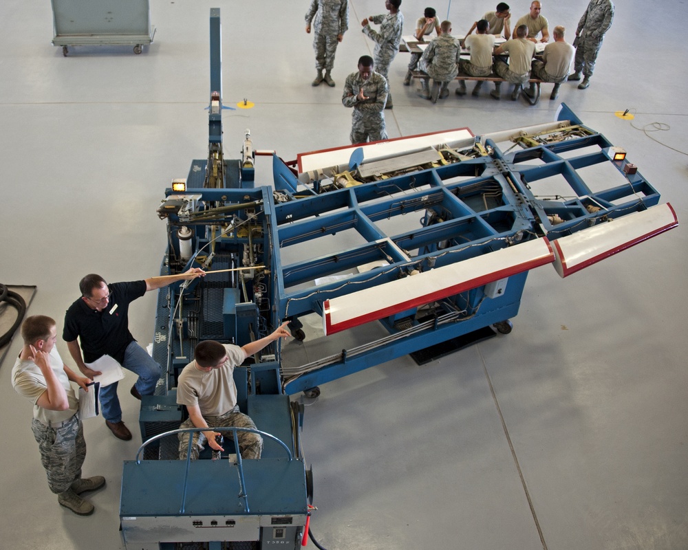 Adjust the role trim on an A-7 Flight Control Trainer