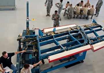 Adjust the role trim on an A-7 Flight Control Trainer