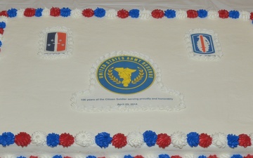 US Army Reserve crest flanked by regimental insignia cake