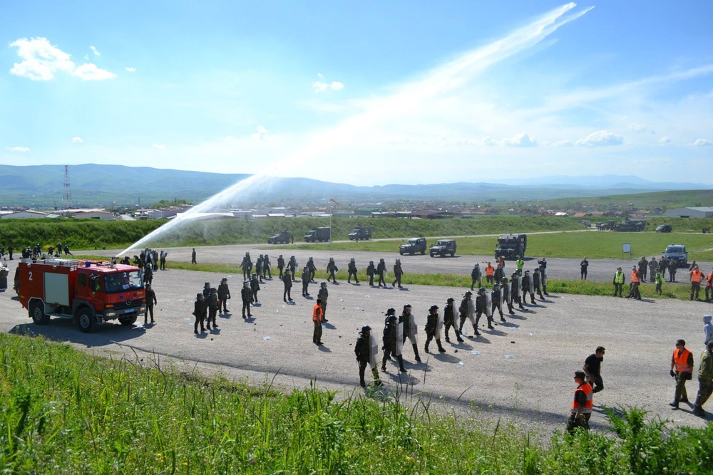 Water cannon demonstration at Camp Novo Selo