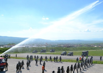 Water cannon demonstration at Camp Novo Selo