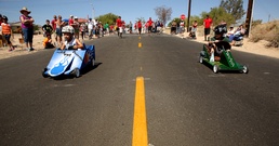 Combat Center kids, adults showcase cars