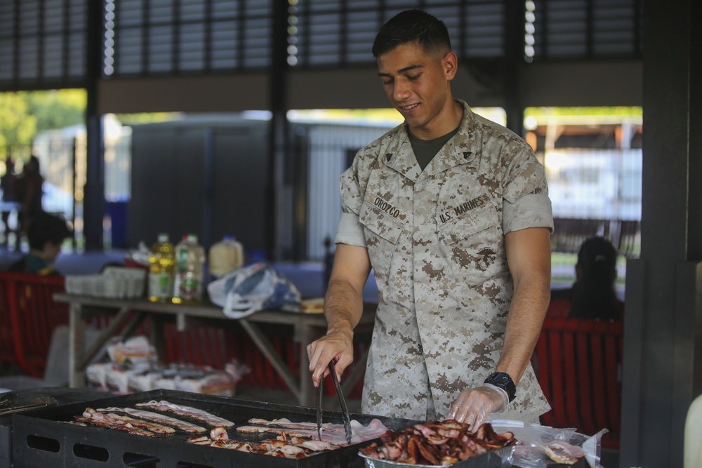 MRF-D Marines cook food for Alawa primary school