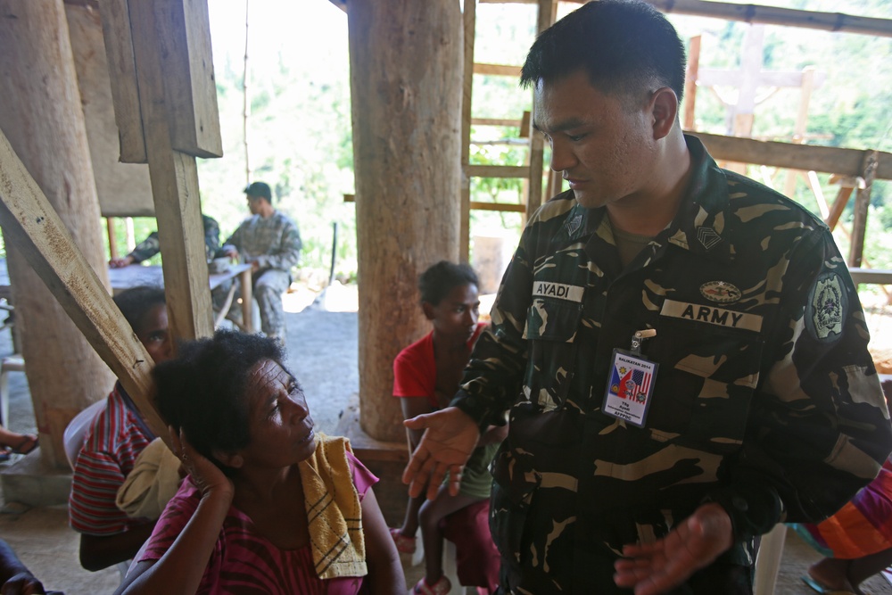 U.S. and Philippine soldiers bond with local tribe during &quot;Bayanihan&quot; as part of BK14