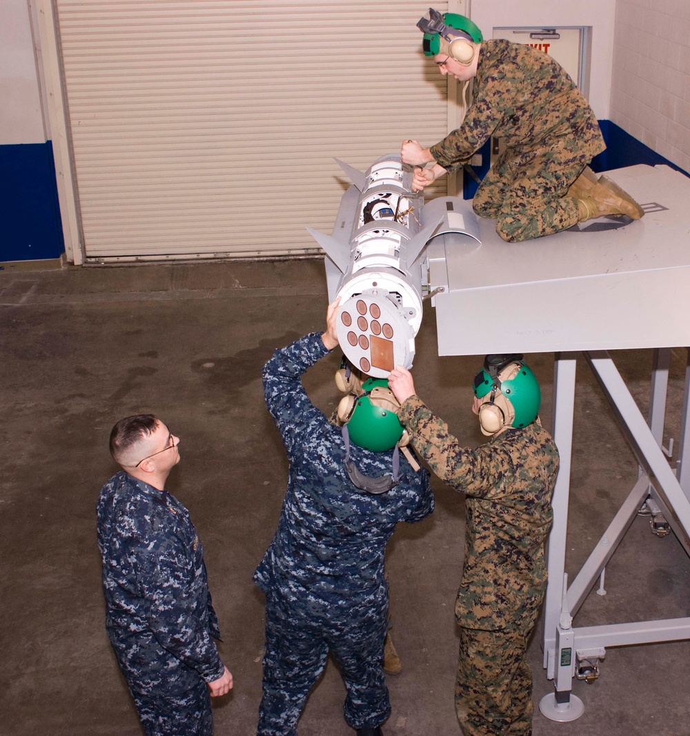 Installing wing-tip POD