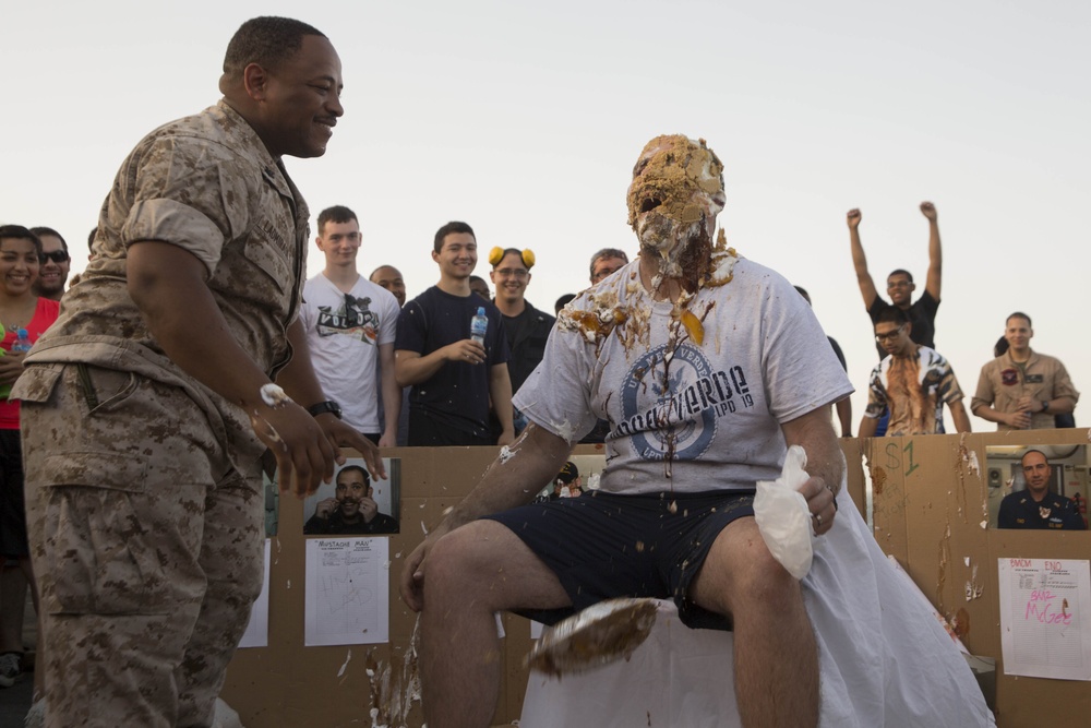 Marine, Sailors take pie to the face for fundraiser