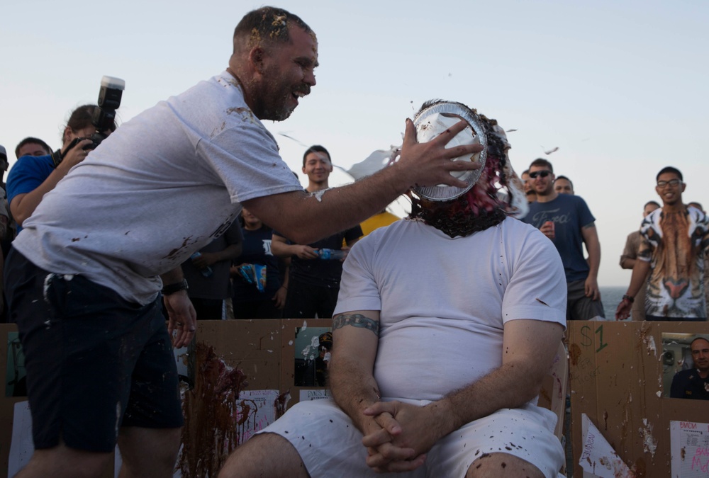 Marine, Sailors take pie to the face for fundraiser