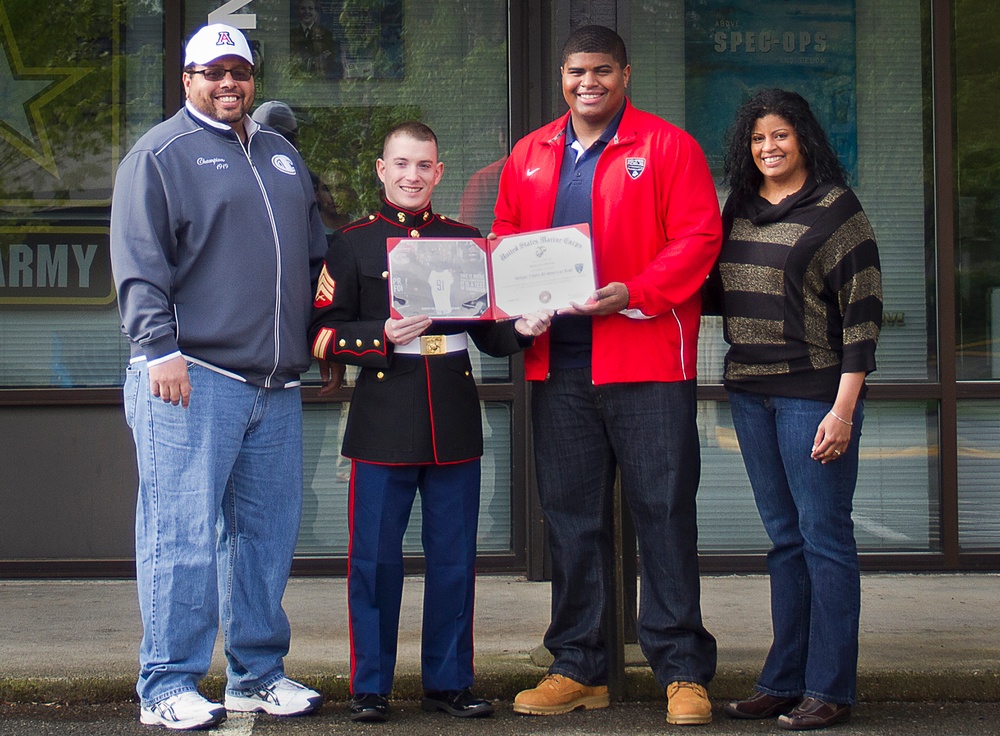 Bellevue football star recognized for participation in Marines' 2014 Semper Fi Bowl