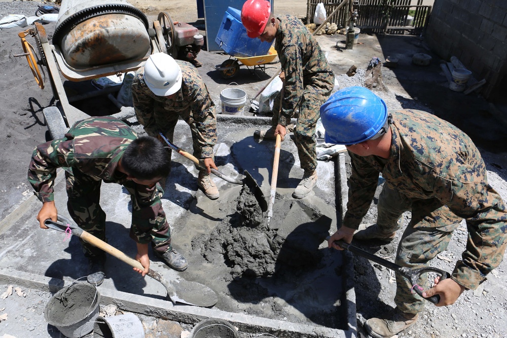 Members of the AFP U.S. armed forces conduct build a comfort room and school room in Guinobatan, Philippines