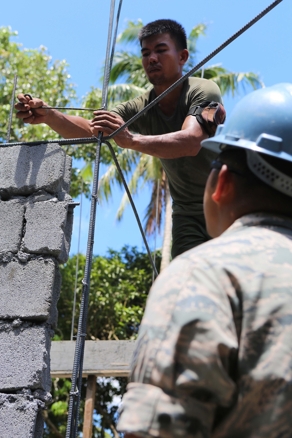 Members of the AFP U.S. armed forces conduct build a comfort room and school room in Guinobatan, Philippines