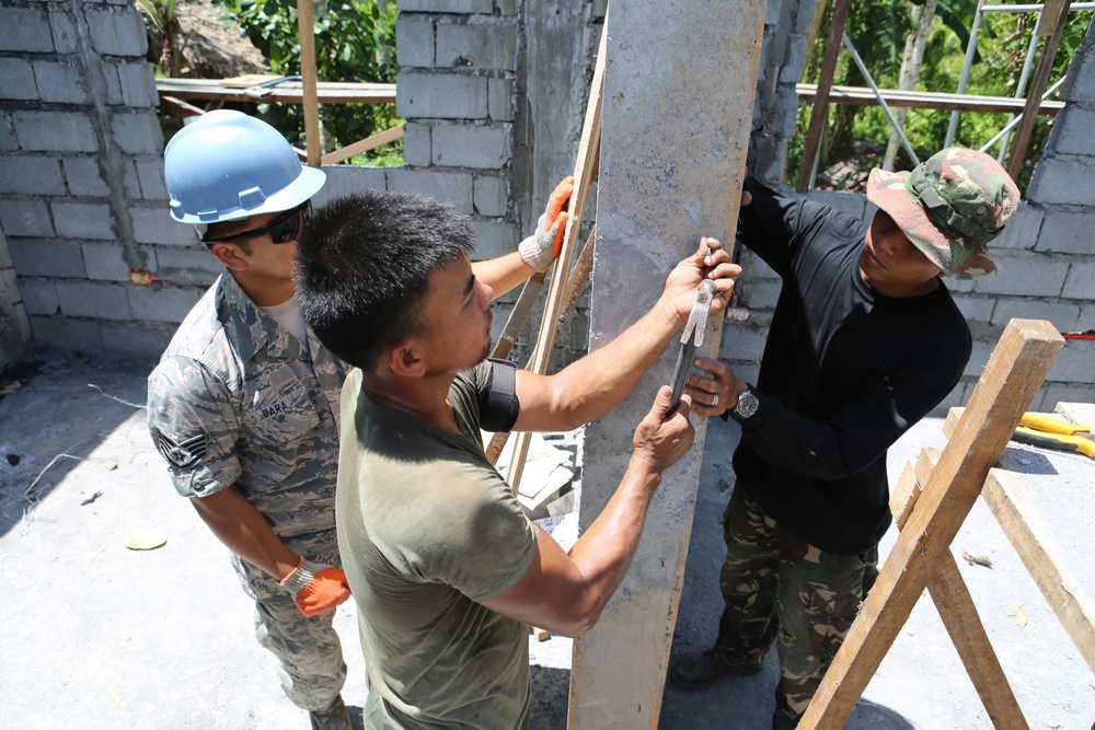 Members of the AFP U.S. armed forces conduct build a comfort room and school room in Guinobatan, Philippines