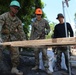 Members of the AFP U.S. armed forces conduct build a comfort room and school room in Guinobatan, Philippines
